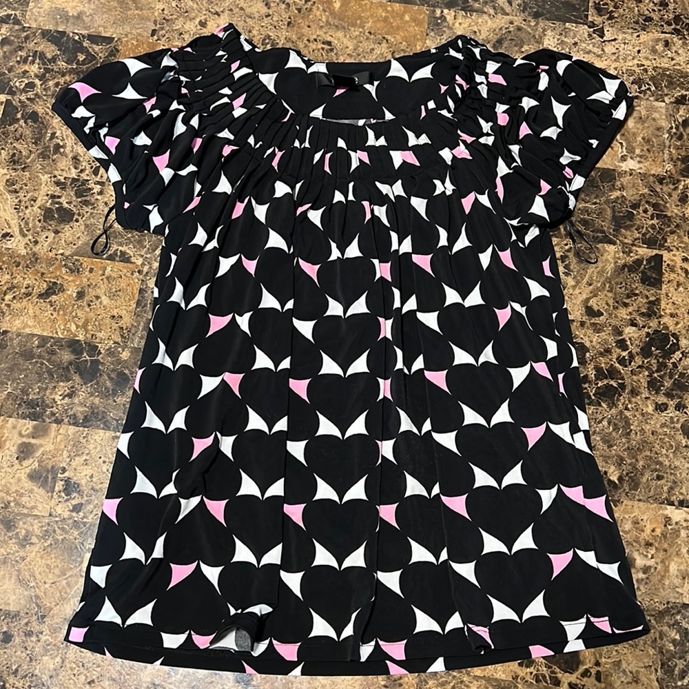 Black blouse with geometric pattern